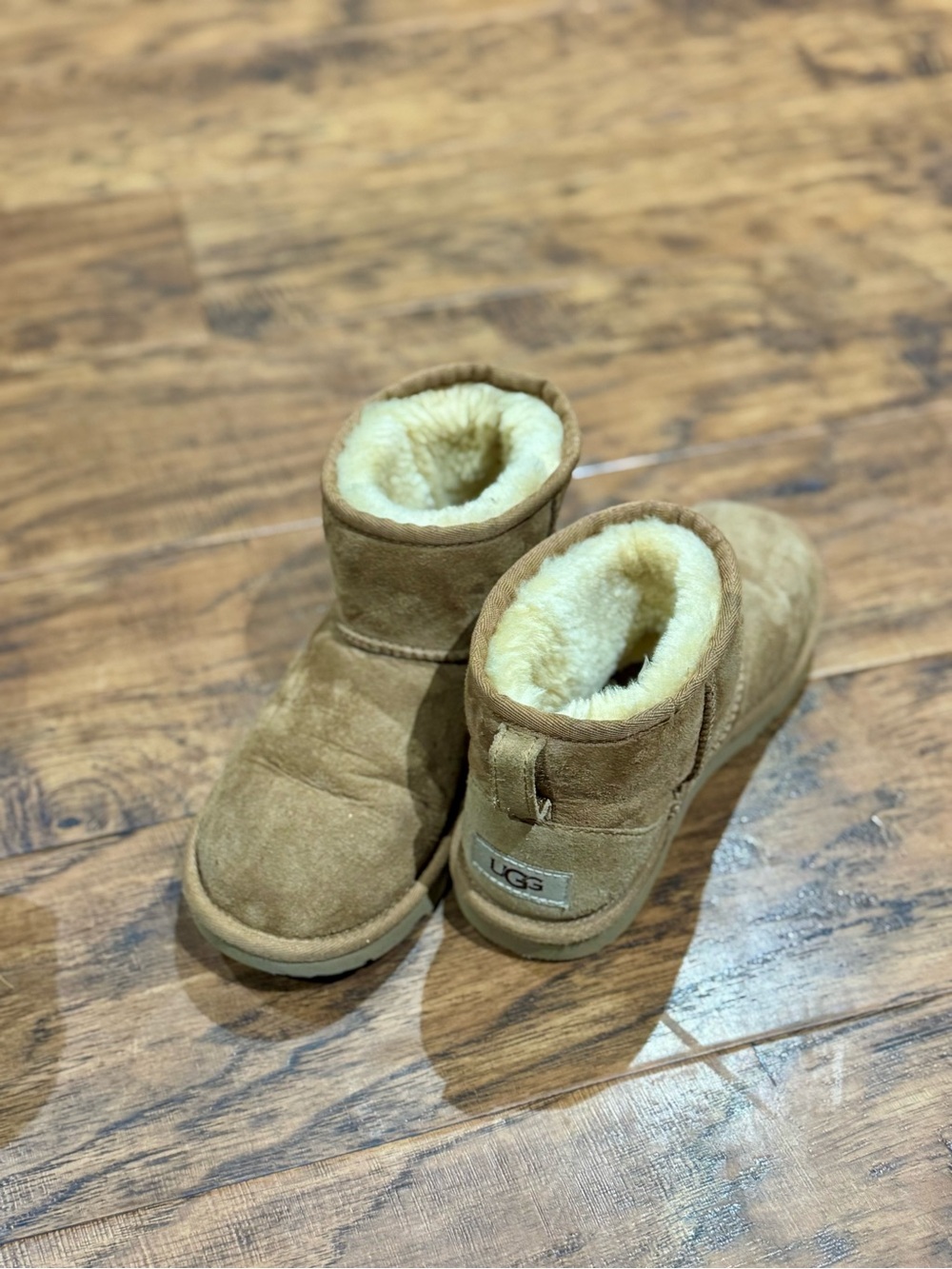 UGG Kids Mini Booties in Chestnut Brown